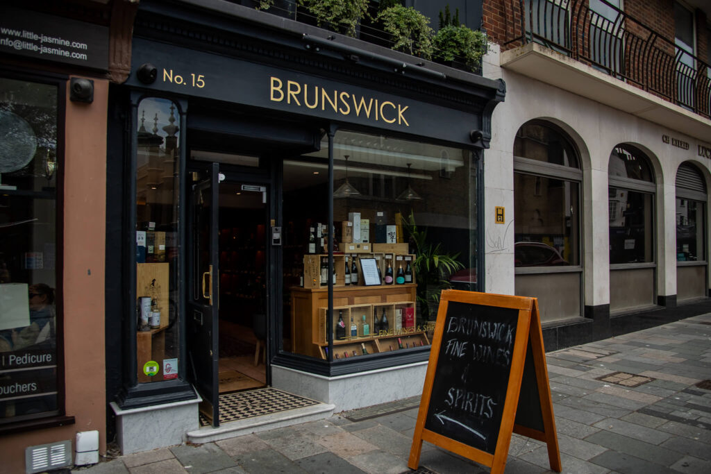 the front sign outside brunswick fine wines and spirits in Brighton